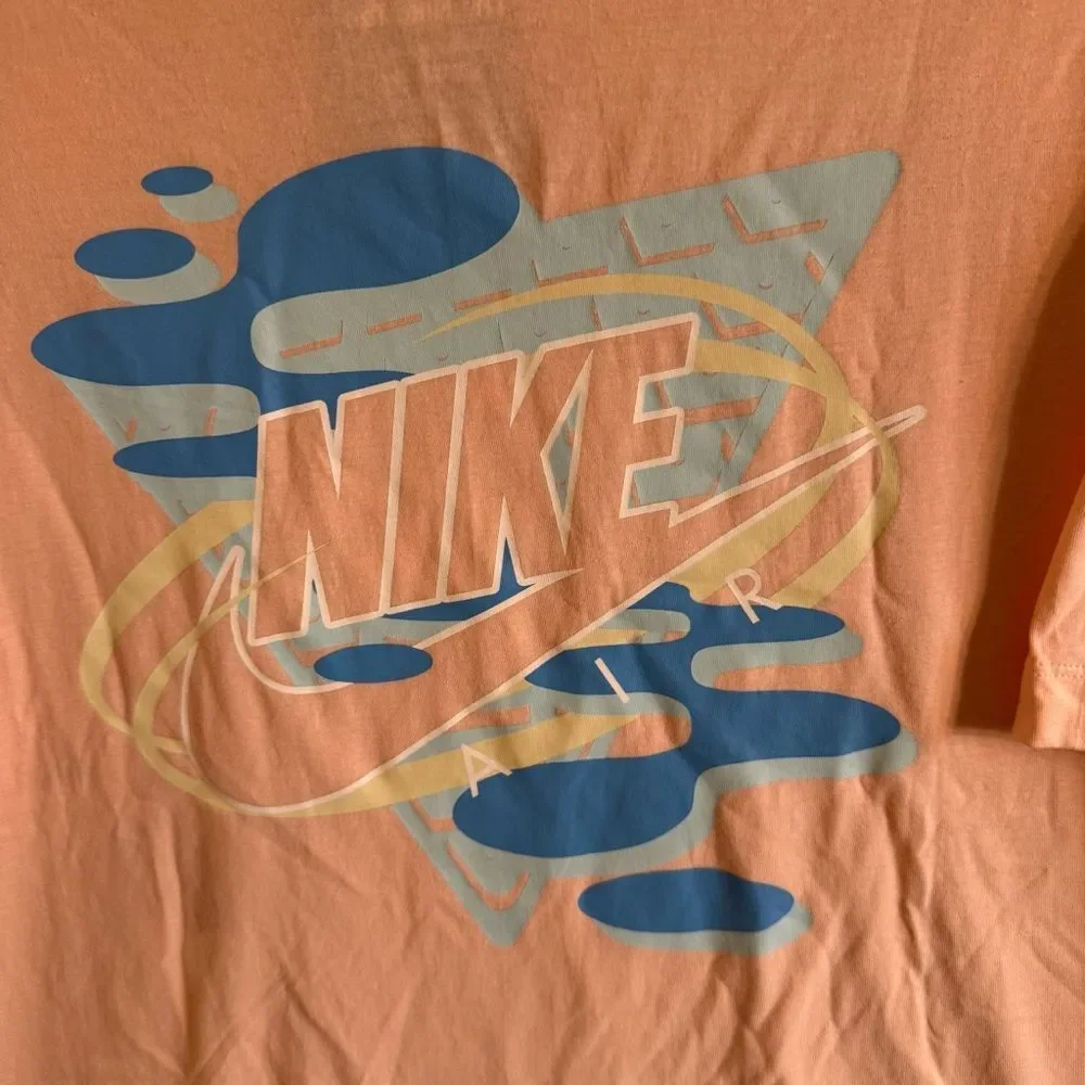 NWT Nike Men's Light Pink 100% Cotton Tee w Blue Graphic Logo Front & Back- L